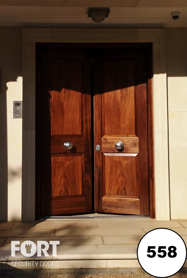 0558 Walnut Wood Grain Double Security Doors With Chrome Ironmongery And Portico Entrance
